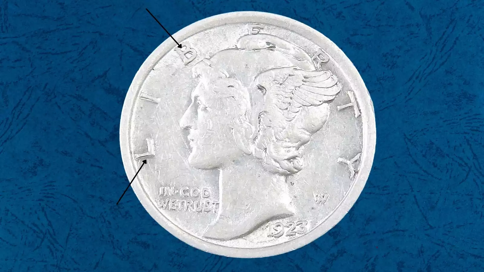 1923 Mercury dime doubled die error showing doubling on LIBERTY inscription under magnification